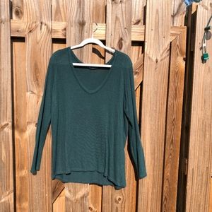 dark green v-neck sweater
